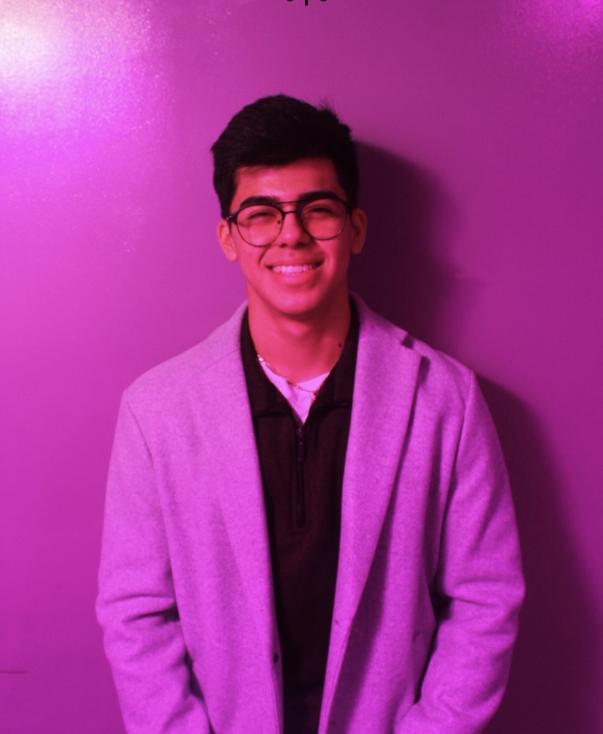 Picture of Gabe Ramirez, with purple background
